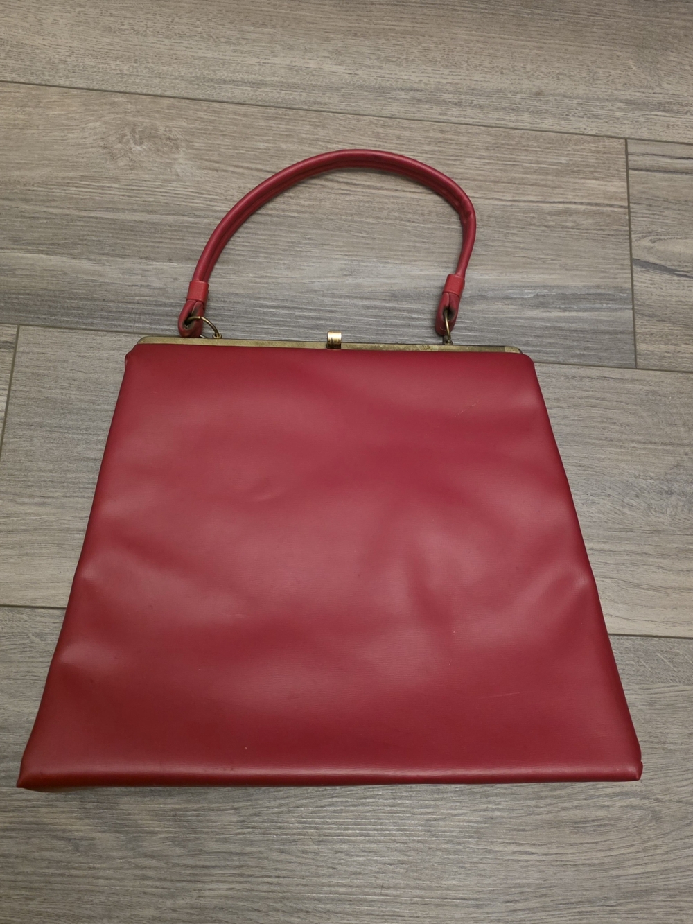 Structured Red Top-Handle Shoulder Bag with Gold Trim